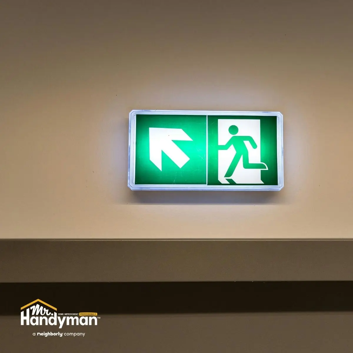 A green emergency exit sign.