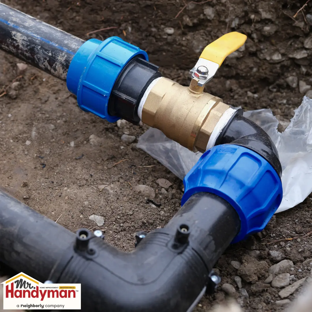 handyman installing a water-efficient fixture in a West Nashville Tennessee
