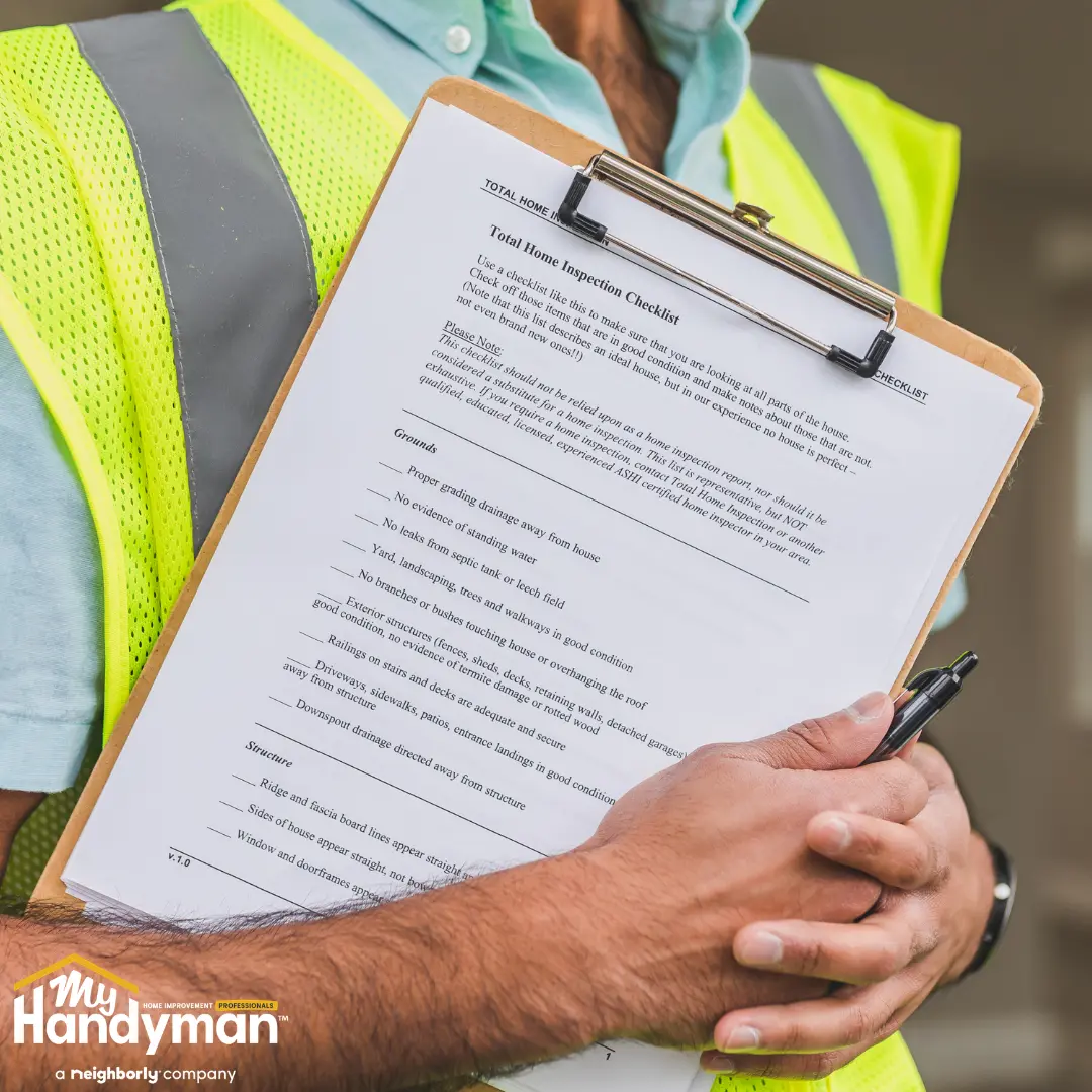 handyman performing commercial building maintenance