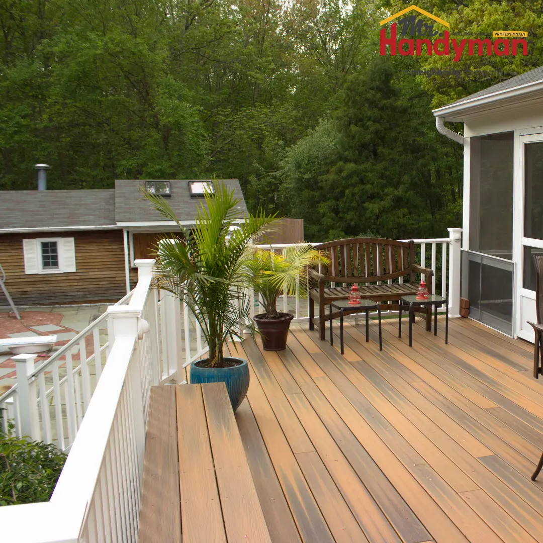 spacious wooden deck with potted plants