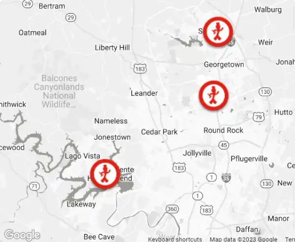 A black-and-white map of the Austin, TX, area, showing the three Mr. Handyman locations with circular red icons.