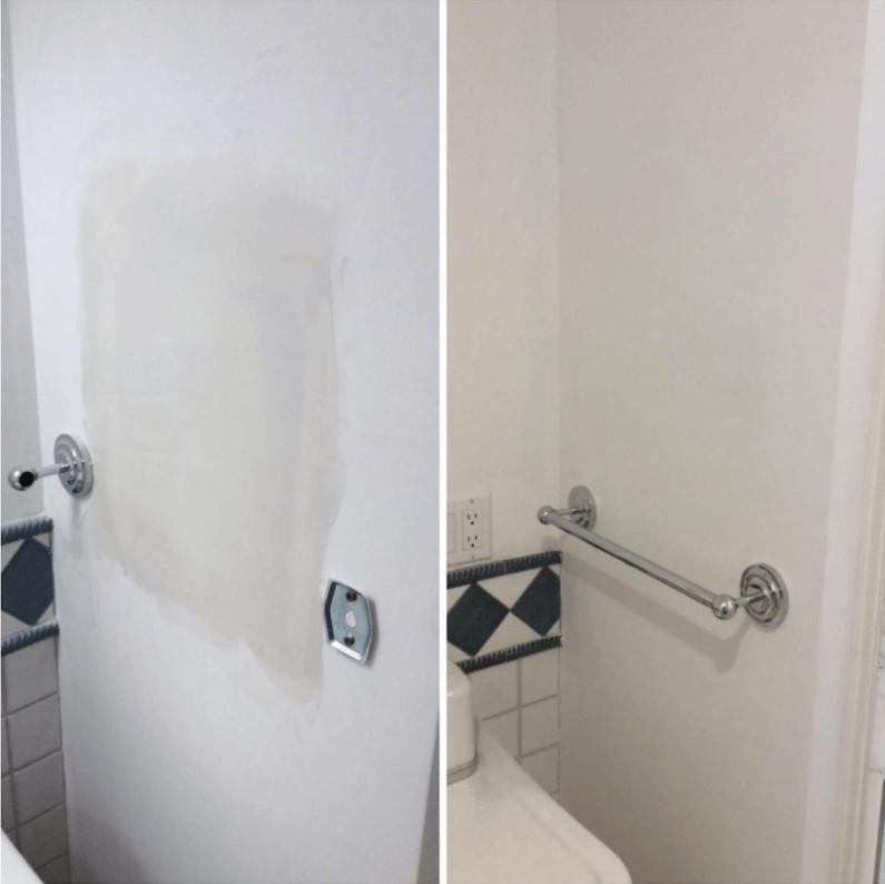 A wall in a residential bathroom after it has been patched and painted by Mr. Handyman.