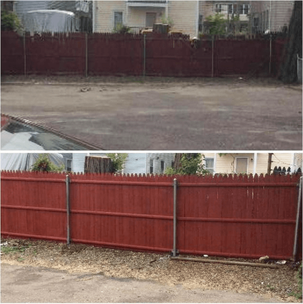 A fence that has been refinished and cleaned with services from the team at Mr. Handyman.