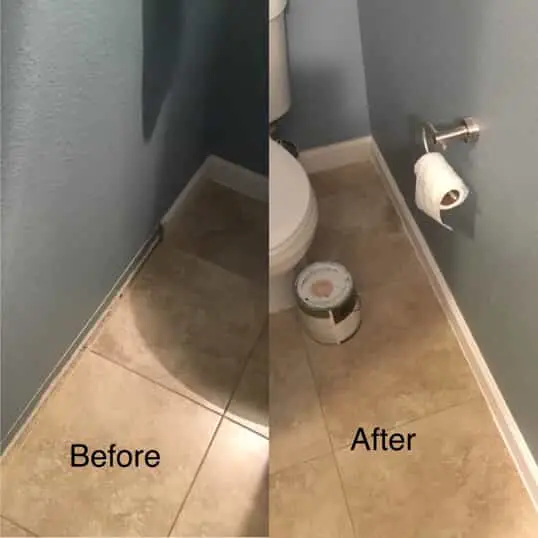 A broken baseboard in a residential bathroom before and after it has been fixed by Mr. Handyman.