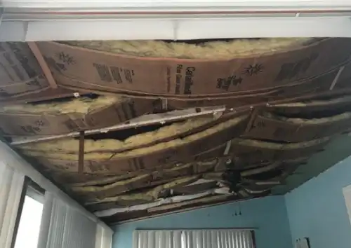 An attic ceiling with insulation visible as it's being installed by Mr. Handyman of Northern Virginia - Arlington to Haymarket.