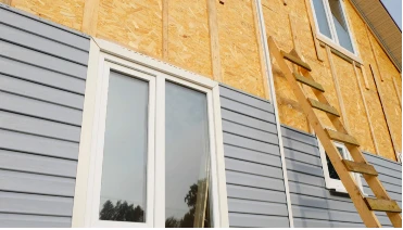 Residential home in boulder undergoing siding replacement service