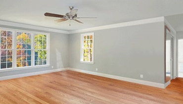 empty room with hardwood flooring