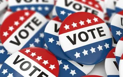 Red, white, and blue VOTE buttons