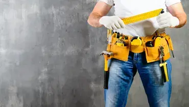 handyman wearing work belt.