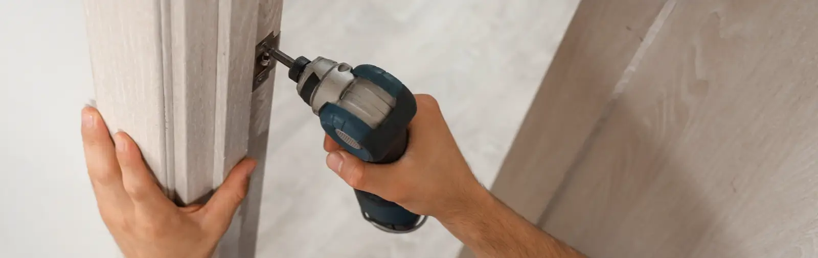 A door latch being worked on