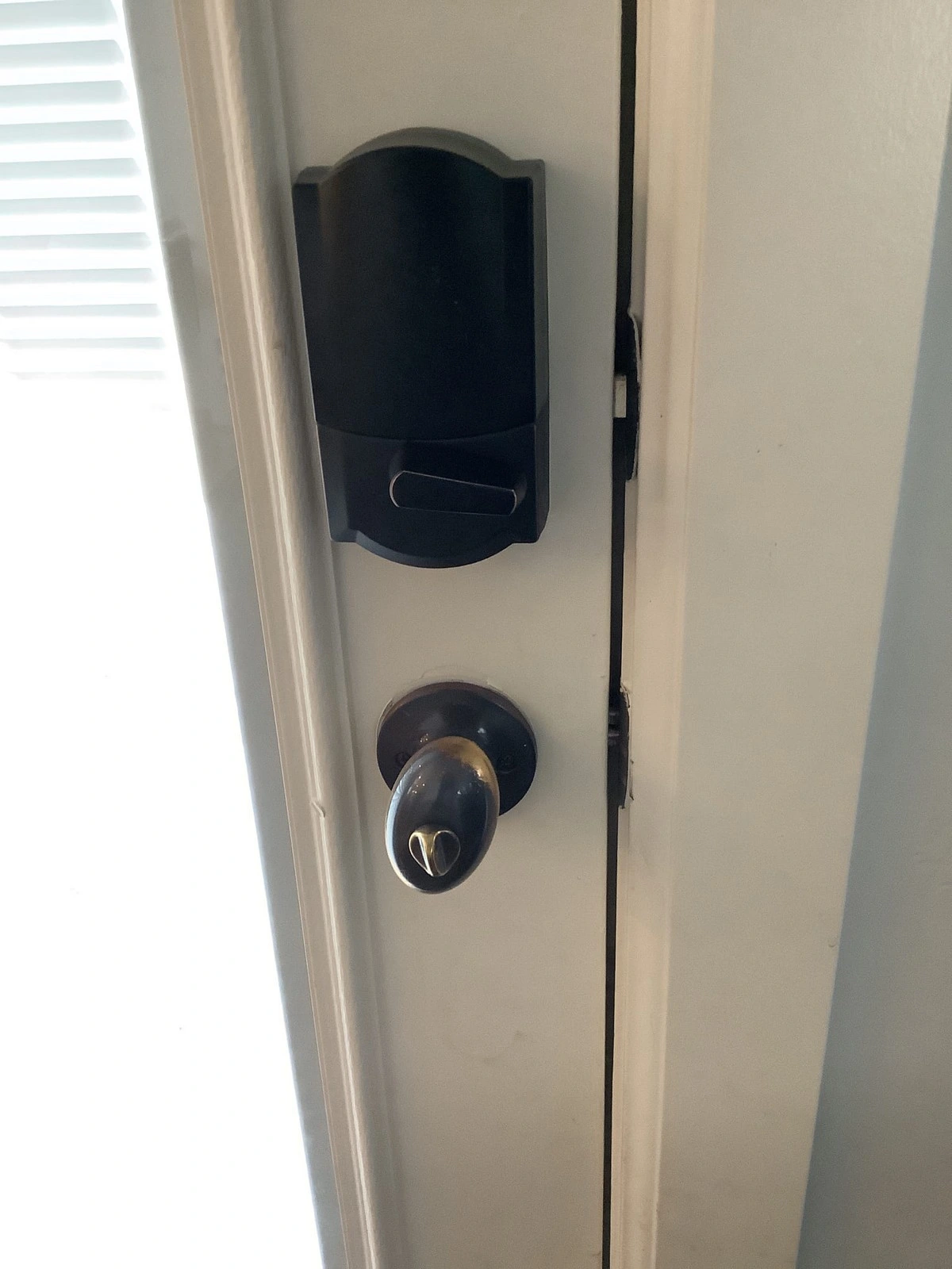 Freshly repaired Lehi door handle by Mr. Handyman