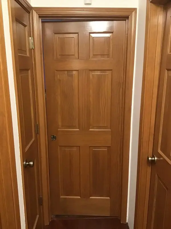 A door at the end of a home’s hallway installed with Mr. Handyman’s services for door installation in Collinsville, IL.