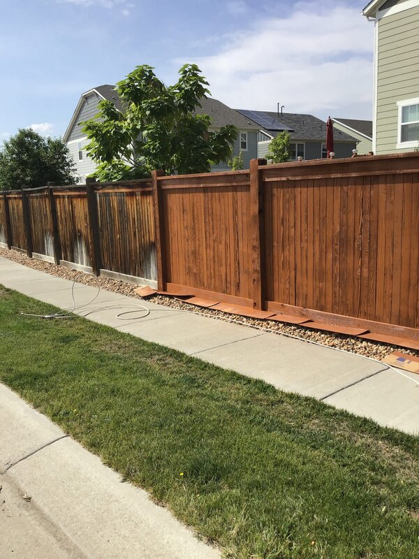 Newly installed section of fence on Boulder property by Mr. Handyman.