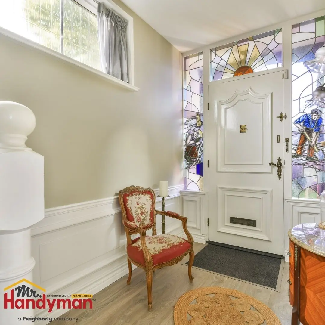 Mr. Handyman technician installing built-in mudroom bench and storage in a Plano, Texas home.