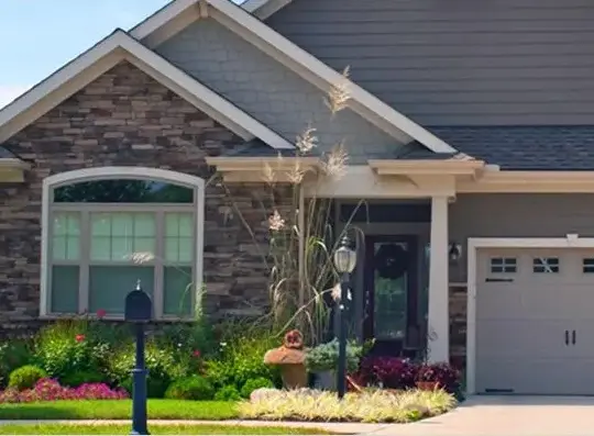 two story house with brick front