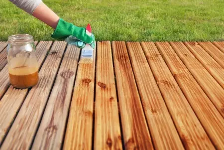 hand staining deck with brush