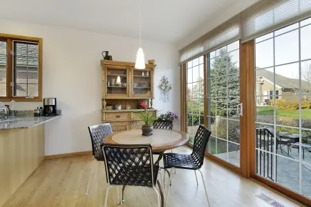 dining room with patio door