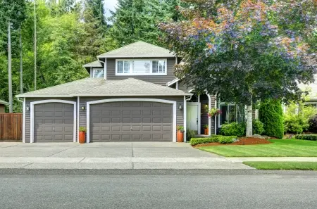 gray house with double garage doors