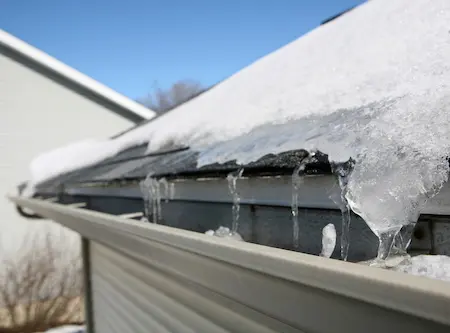 house gutter with ice