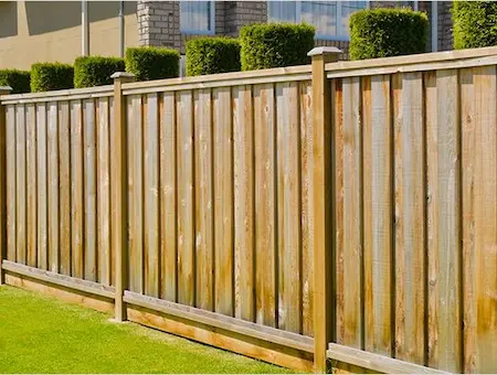 wooden fence around a yard