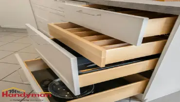 Mr. Handyman technician installing a custom closet organization system in a Murrysville, Pennsylvania home