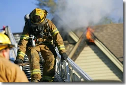 House-Fire Fire rescue team in a house roof.