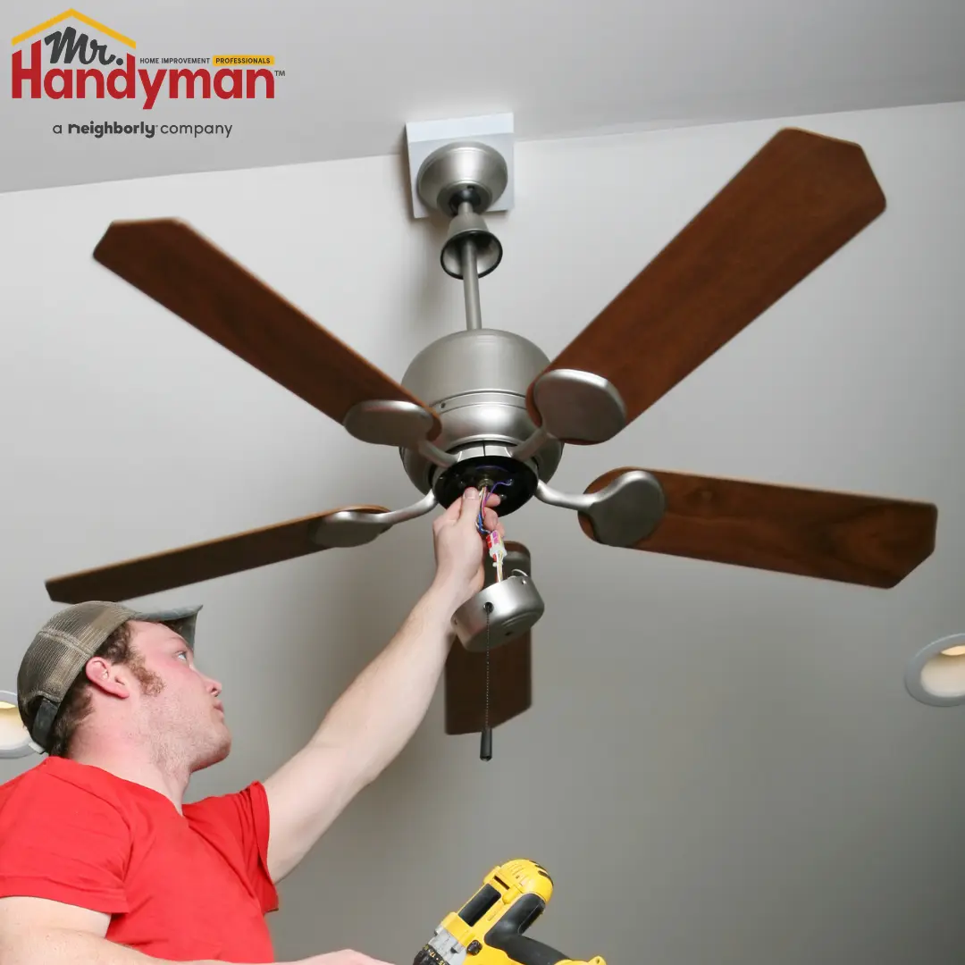 Mr. Handyman technician installing a new kitchen backsplash in a Martinsburg, West Virginia home during summer remodeling season