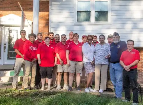 2017 team photo in front of veteran's home for National Day of Service.