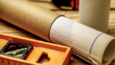 blue print rolled into a tube